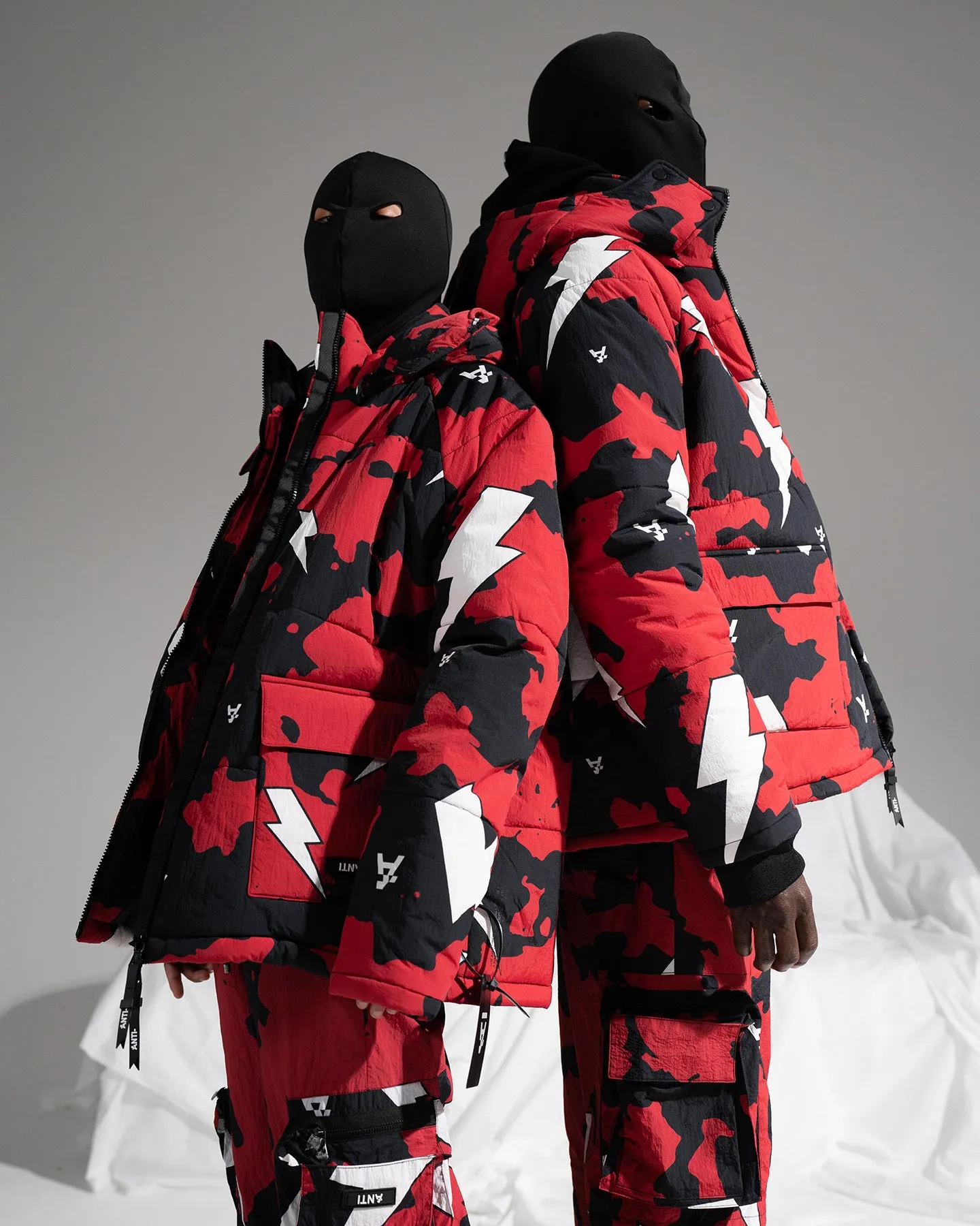 The Anti Order Storm Camo Puffer Jacket Black/Red/White